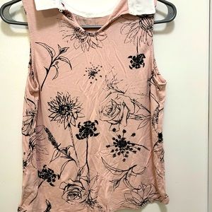 Sleeveless collared T-shirt